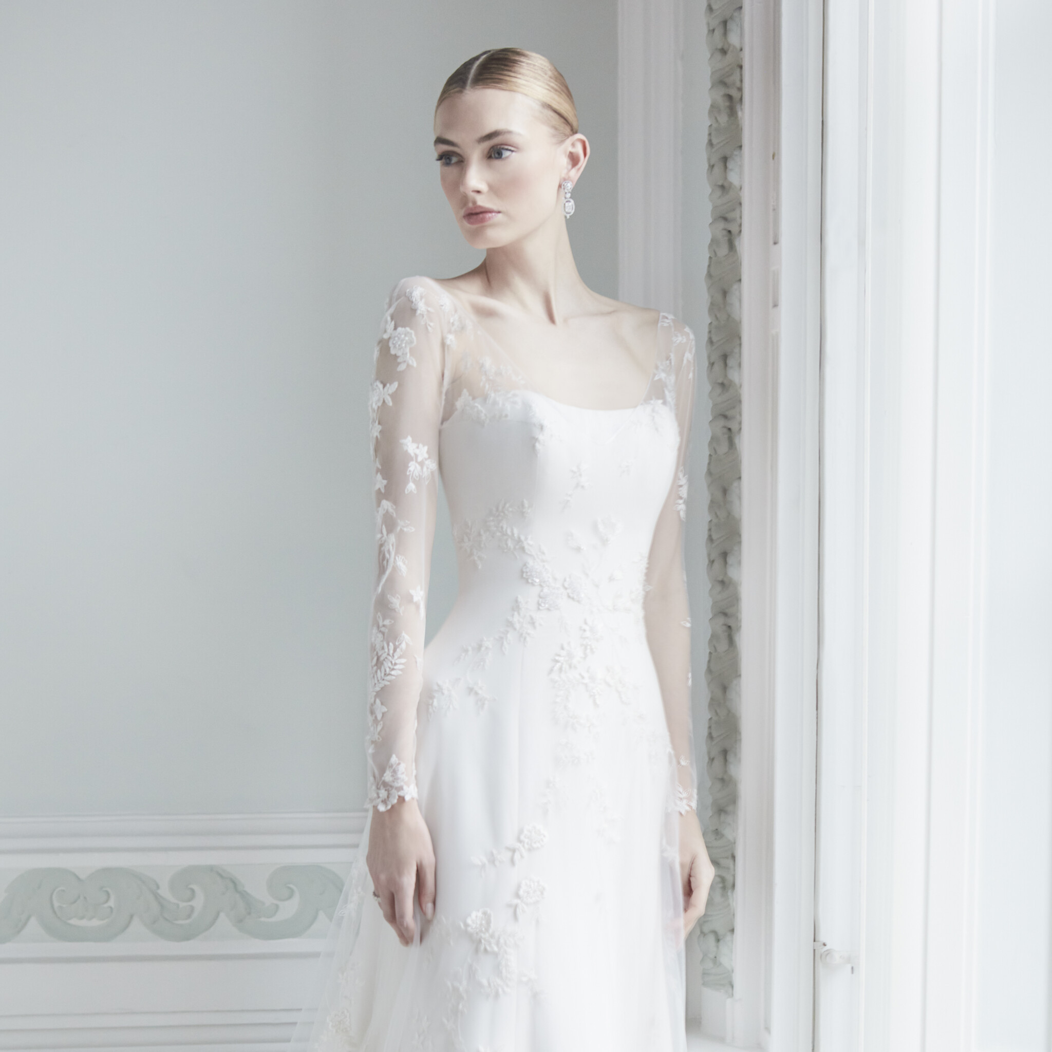 Phillipa Lepley Couture Wedding Dress London Nude Tallulah Crepe With Thomasina Woodland Jasmine Overlay strapless crepe princess-line wedding gown worn with hand embroidered floral overlay with deep v neckline with crystal and sparkle bead detail