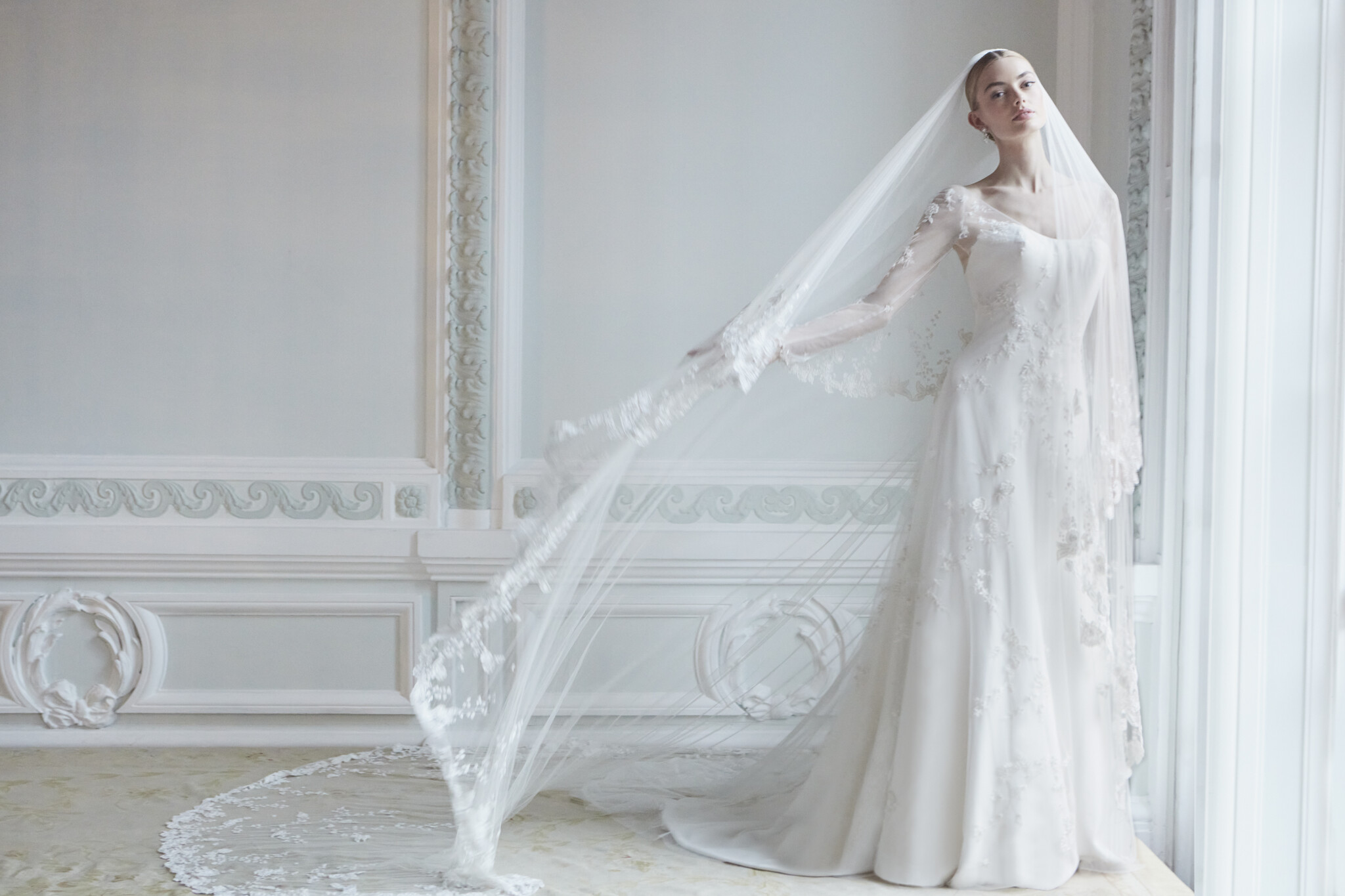 Phillipa Lepley Couture Wedding Dress London Nude Tallulah Crepe With Thomasina Woodland Jasmine Overlay strapless crepe princess-line wedding gown worn with hand embroidered floral overlay with deep v neckline with crystal and sparkle bead detail