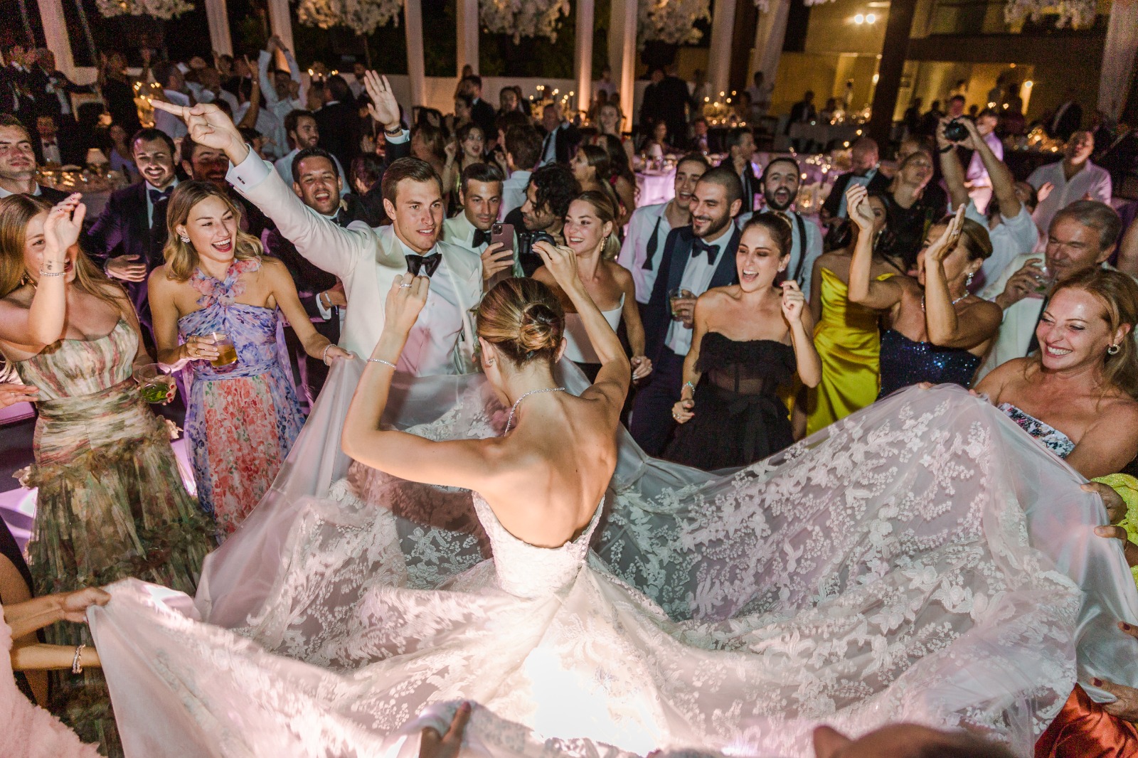Phillipa Lepley Bride Wearing Strapless Corseted Wedding Dress With Floral Embroidery