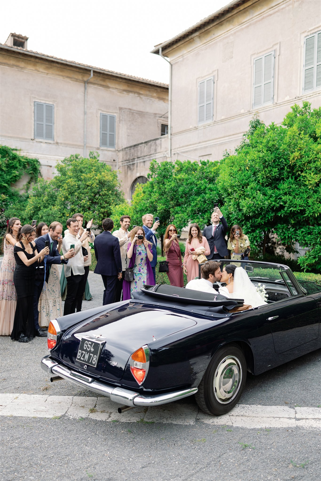 Phillipa Lepley Bride Tosca Bespoke Duchess Satin Long Sleeve Wedding Dress with Square Neckline and Removable Overskirt Rome Wedding