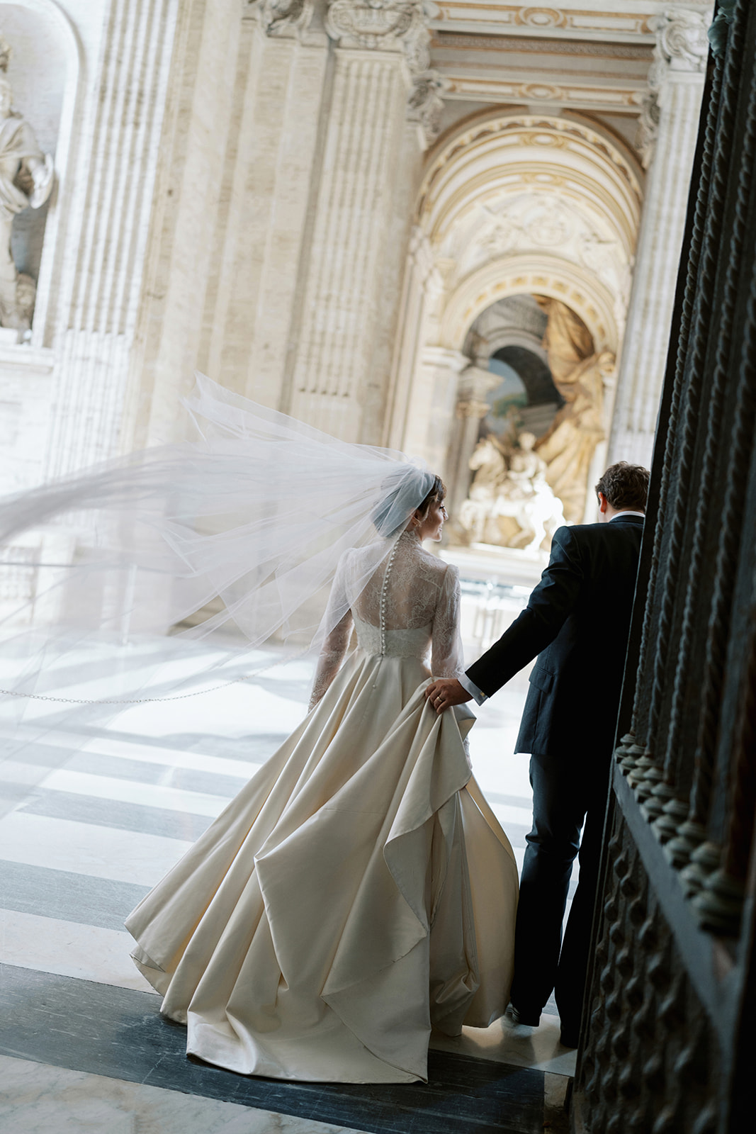 Phillipa Lepley Bride Taylor Bespoke Vatican Wedding Dress Duchess Satin Strapless Gown And Lace Long Sleeve Top With Embroidered Script Veil