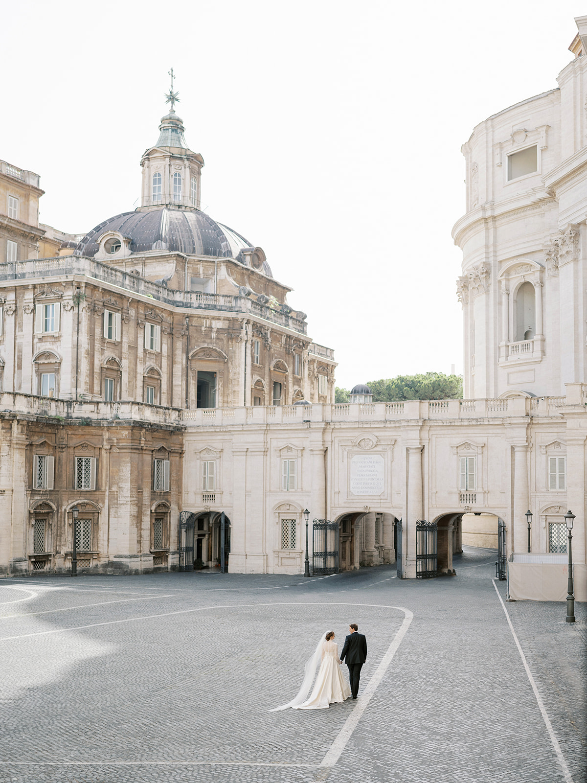 Phillipa Lepley Bride Taylor Bespoke Vatican Wedding Dress Duchess Satin Strapless Gown And Lace Long Sleeve Top With Embroidered Script Veil