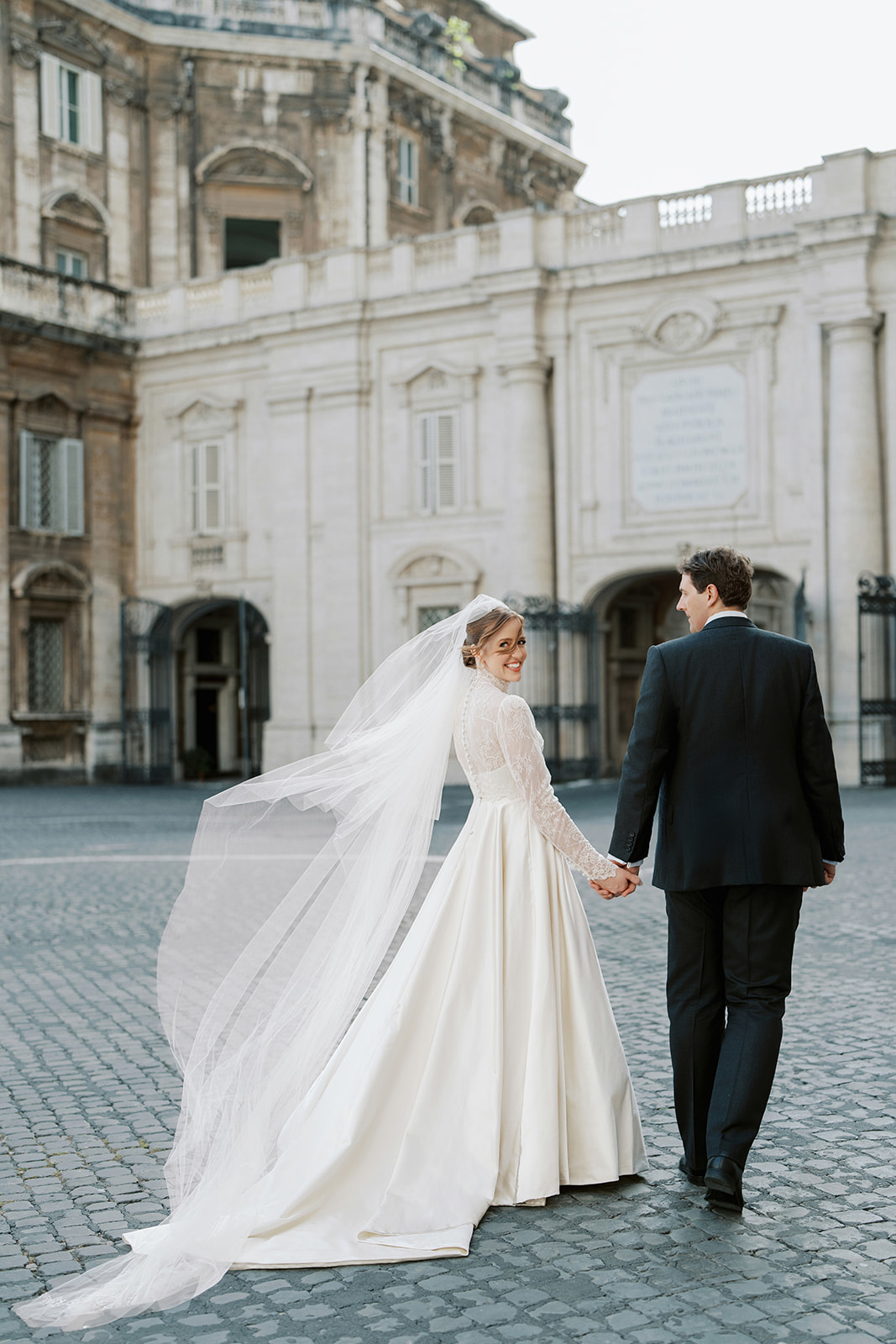 Phillipa Lepley Bride Taylor Bespoke Vatican Wedding Dress Duchess Satin Strapless Gown And Lace Long Sleeve Top With Embroidered Script Veil