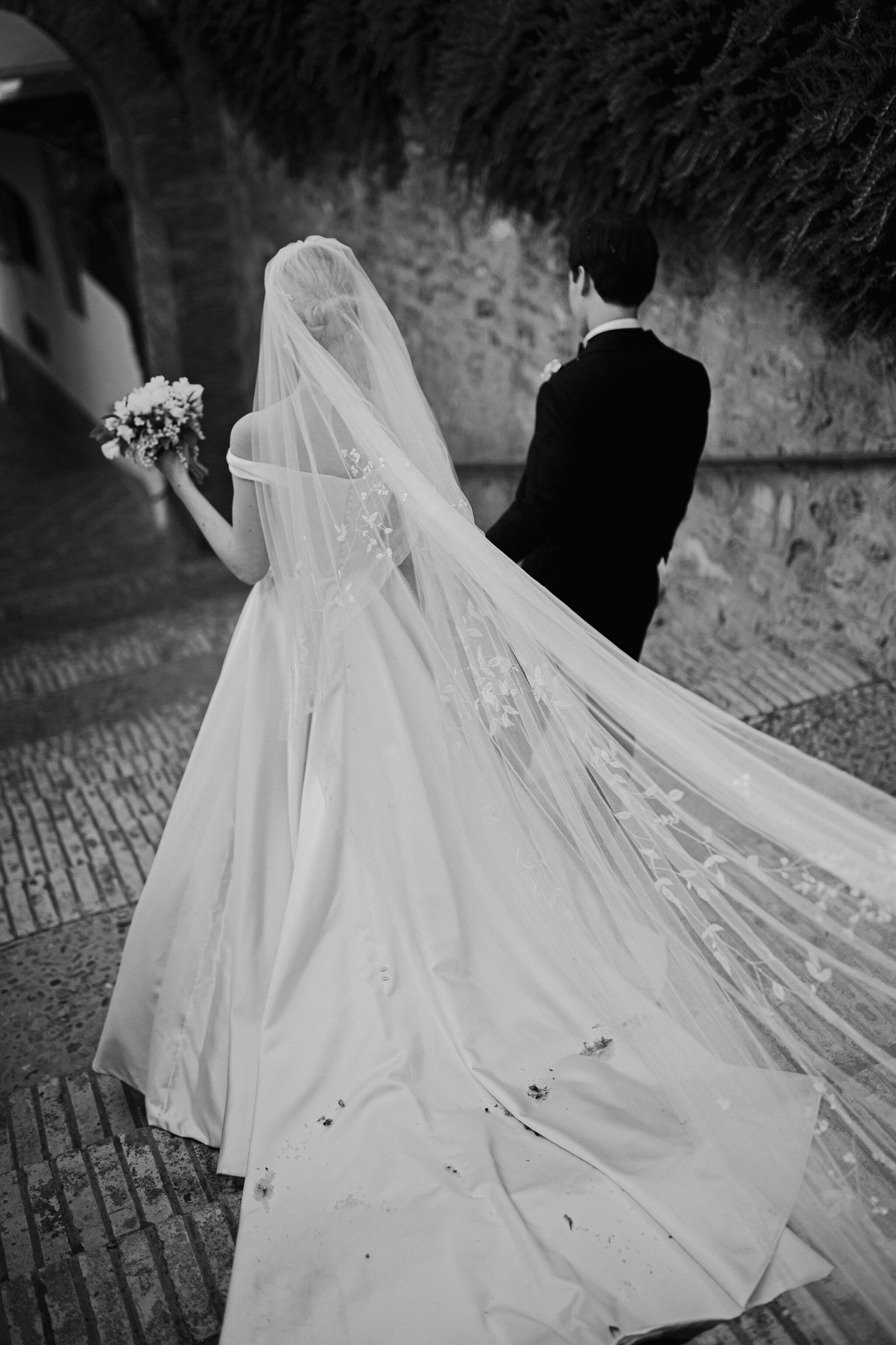 Phillipa Lepley bride Alexandra Timeless Duchess Satin Couture Wedding Dress with Bow and Hand Embroidered Veil Destination Spanish Wedding